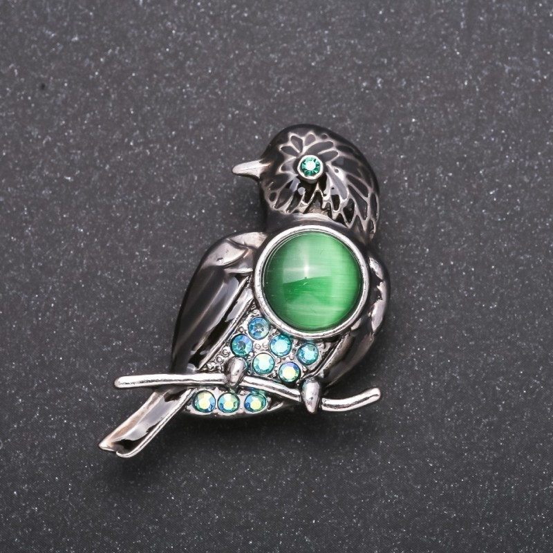 Broșă Pasăre, cristale albastre, efect hameleon, culoare metal gri, 40×25 mm