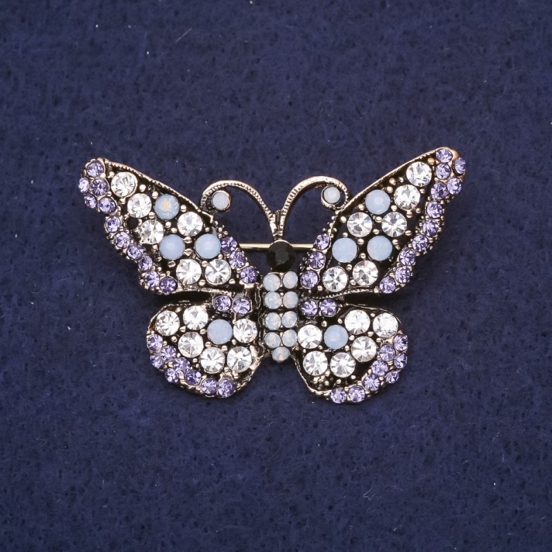 Broșă «Fluture» cu strasuri albastre și albe, 28×47 mm, metal argintiu