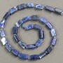 Mărgele din sodalit natural, tăiate la fațetă, pe șnur, dimensiuni 11×7 mm, lungime aproximativă 38 cm ± (cu mărgele de 3×2 mm)