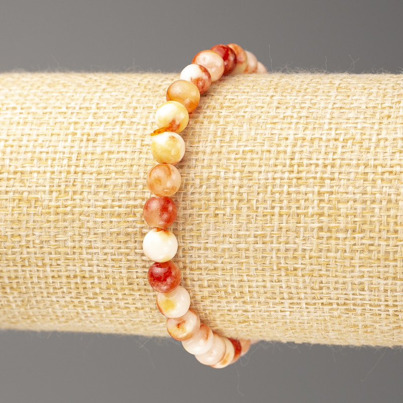 Brățară cu nefrit oceanic (acrilic artificial), alb-galben-roșcat, diametrul bilelor 6 mm, lungimea 18 cm, cu bile netede pe elastic