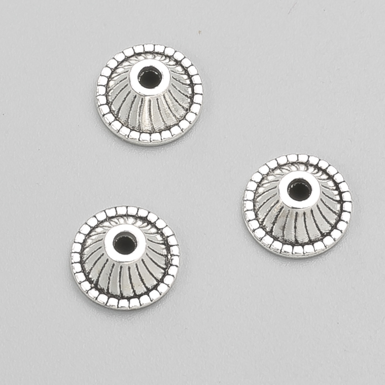 Capăt de terminare – culoare argintiu, diametru 10x5 mm (+/-), ambalare -20 g, 30(+/-) bucăți