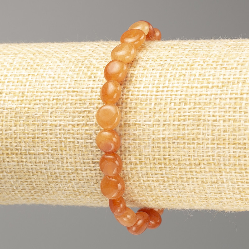 Brățară din carneol natural, piatră fațetată pe elastic, diametrul 7×8 mm ±, lungime 18 cm