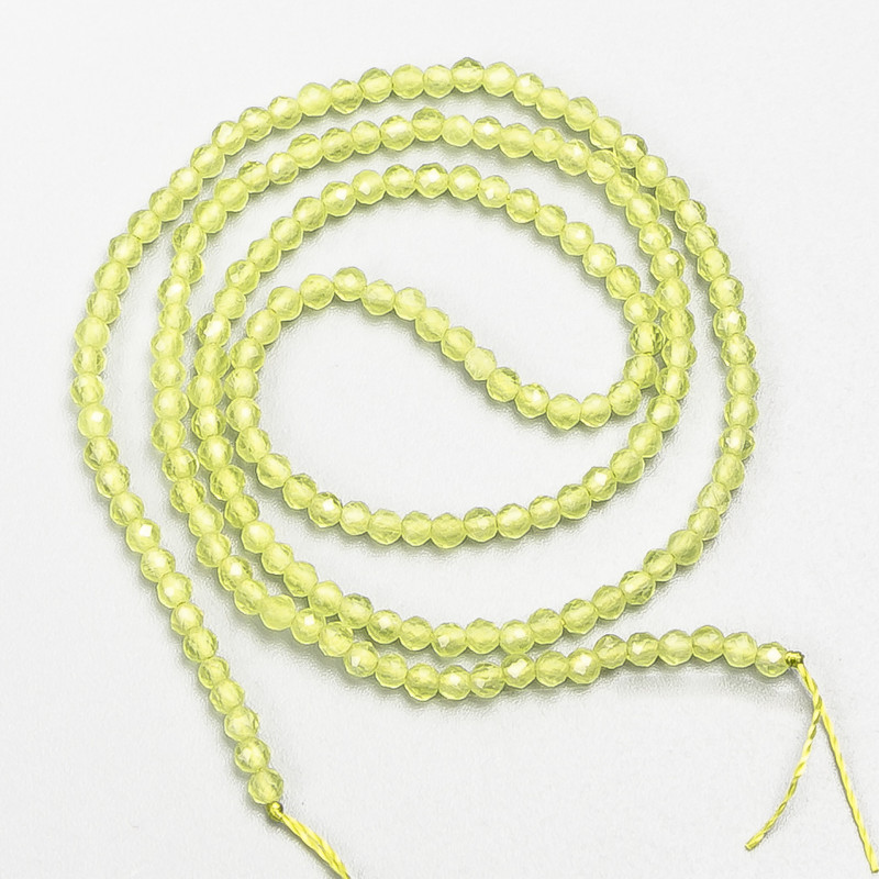 Mărgele mici din spinel sintetic, culoare galben-lime, formă sferică fațetată, diametrul aproximativ 2 mm, pe șnur, lungime 37 cm