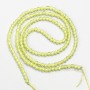 Mărgele mici din spinel sintetic, culoare galben-lime, formă sferică fațetată, diametrul aproximativ 2 mm, pe șnur, lungime 37 cm
