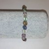 Brățară din fluororit natural fațetată, diametru aproximativ 7x9 mm +/-, pe elastic, lungime 18 cm+