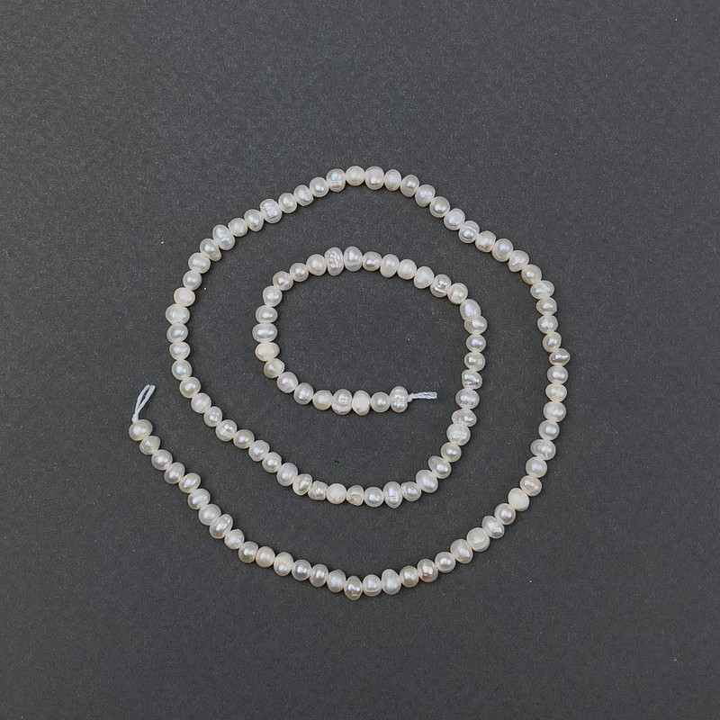 Perle de râu ovale pe șnur, diametrul 6x5 mm, lungime aproximativă 35 cm