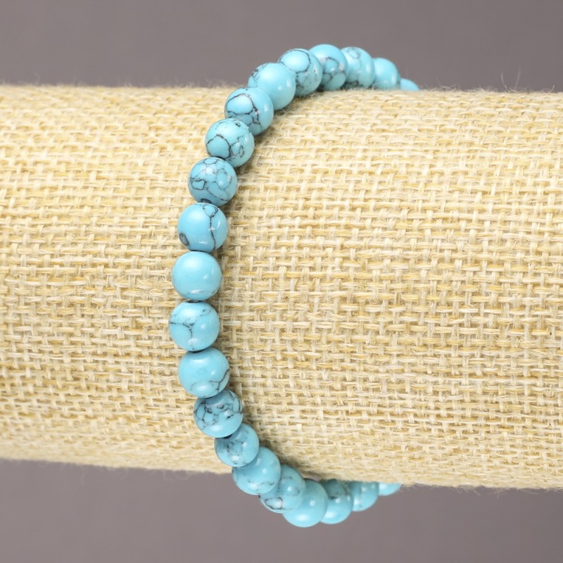 Brățară pe elastic cu turcoaz (presate), mărgele netede, diametrul de 6 mm+