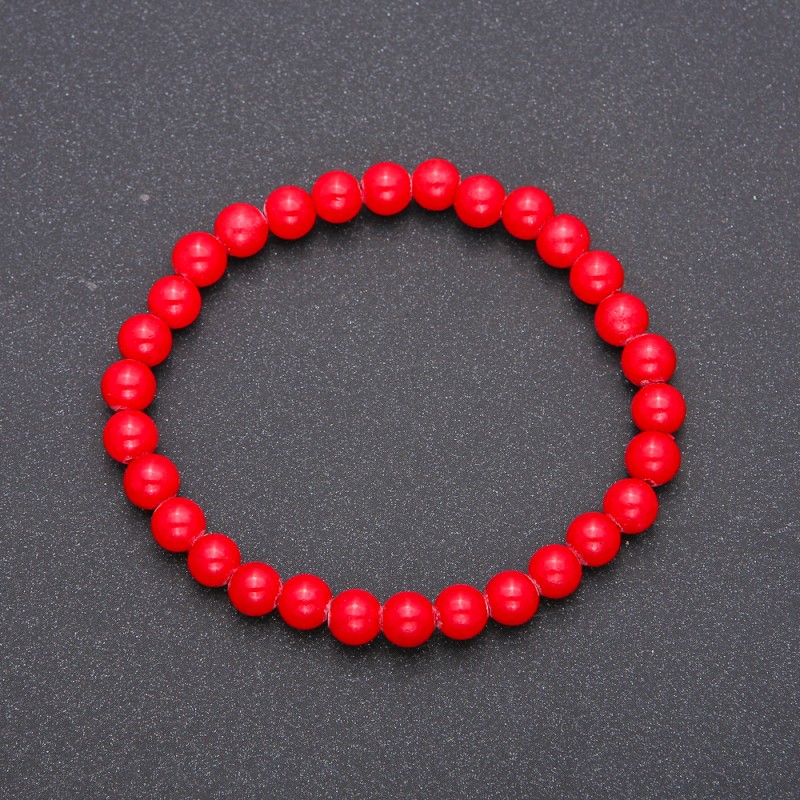 Brățară din coral natural presat pe elastic, bile netede, diametrul de aproximativ 6 mm, lungimea 18 cm