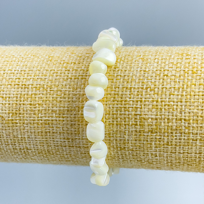 Brățară din sidef alb, fațetată, diametru 8×6 mm ±, lungime 18 cm (elastic)