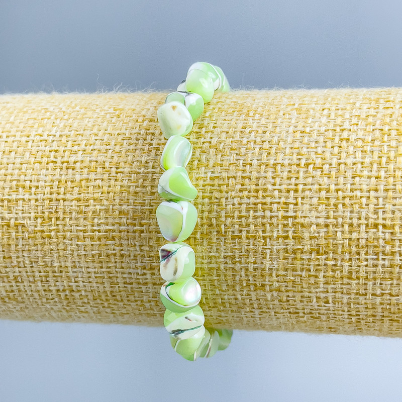 Brățară din sidef verde deschis, mărgele facetate, diametrul 8x6 mm, lungime 18 cm (extensibil)