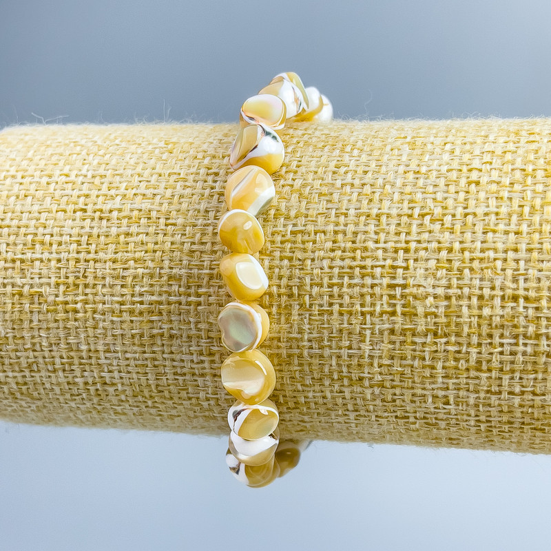 Brățară din sidef bej, fațetată, diametrul 8x6 mm +/-, lungime 18 cm (elastic)
