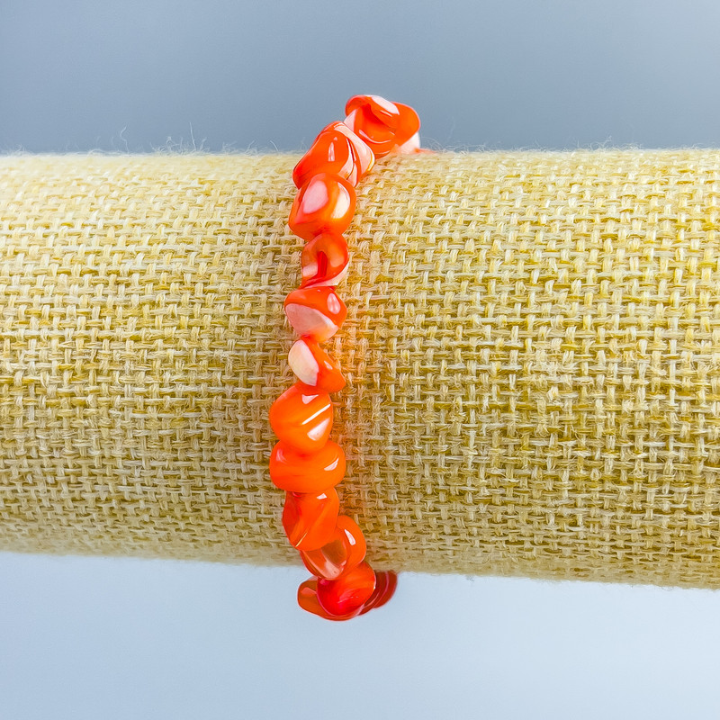 Brățară din sidef portocaliu fațetat, diametru 8x6 mm, lungime 18 cm (extensibil)
