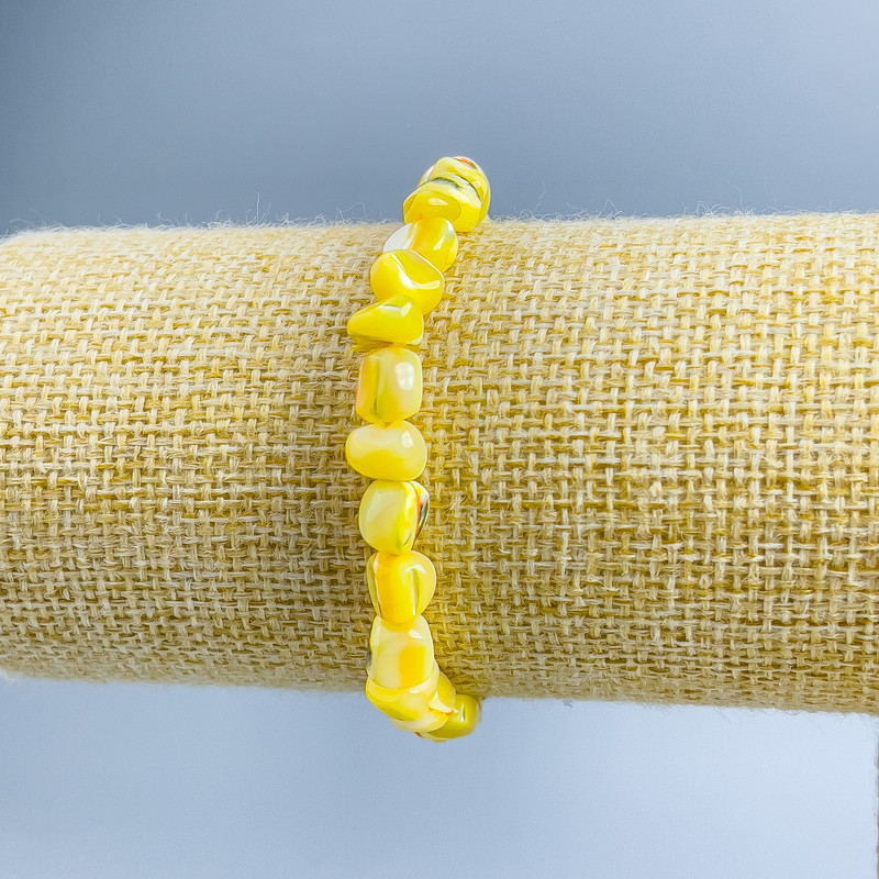 Brățară din sidef galben, cu fațete, diametrul 8×6 mm, lungime 18 cm (extensibilă)