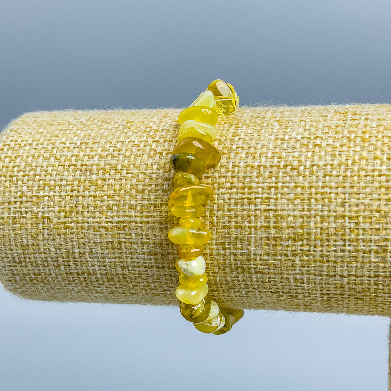 Brățară din agat galben, mărgele tăiate, diametru 8×11–6×8 mm, lungime 18 cm (elastic)