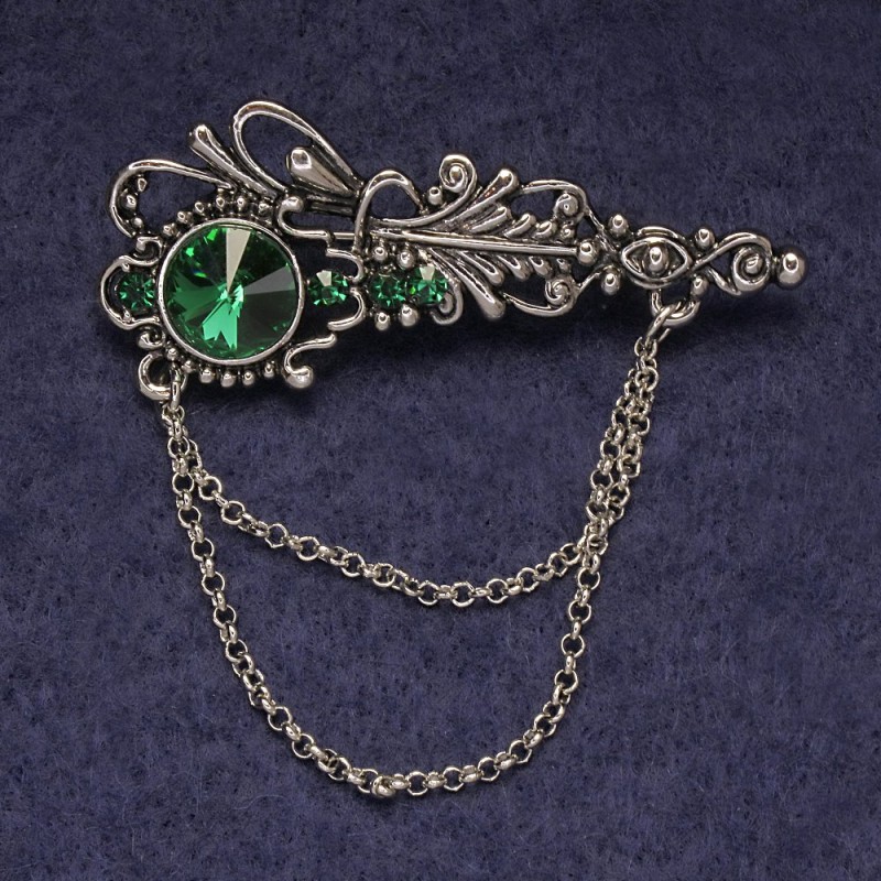 Broșă «Accent» cu strasuri verzi și cristal, metal argintiu 55x22 mm