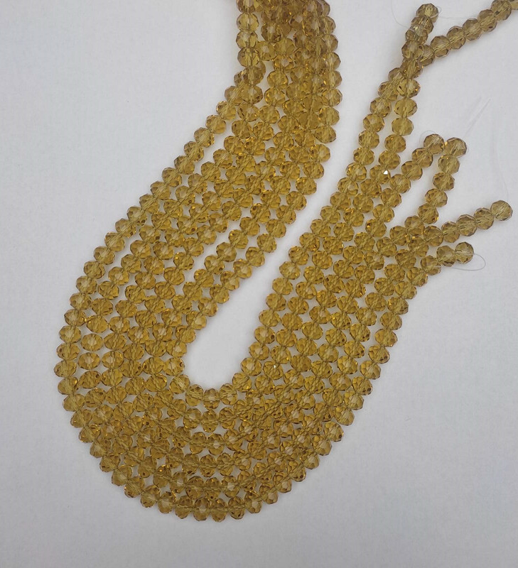 Mărgele cehești cristal transparente în nuanța șampanie, tăiate, rondel, diametrul 8x6 mm, lungime 40 mm +/- pe fir