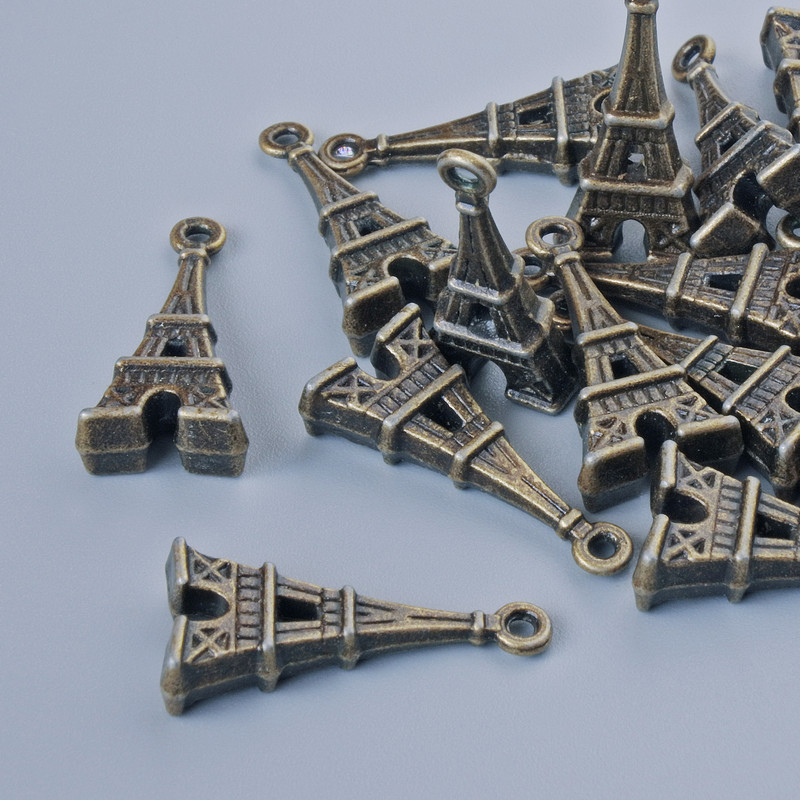 Fitinguri pentru pandantiv «Turnul Eiffel», diametrul 26×9 mm, diametrul orificiului 1,7 mm, ambalaj 13 bucăți ±, culoare bronz a metalului