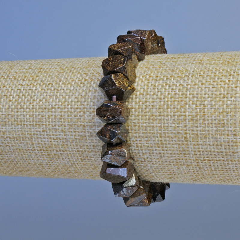 Brățară din bronzit, rondelle tăiate, diametru aproximativ 10x7 mm, lungime 18 cm, elastică