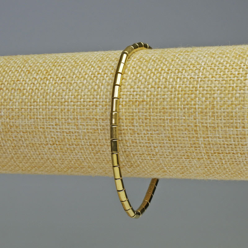 Brățară din hematit, cilindric, culoare aurie, diametru 5×3 mm, lungime 18 cm, pe elastic