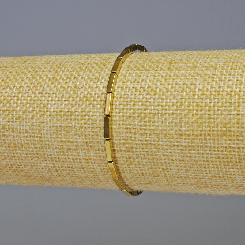 Brățară din hematit, dreptunghiulară, culoare aurie, diametru 7x2 mm, lungime 18 cm, pe bază elastică