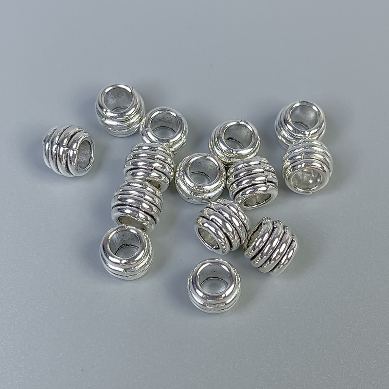 Inserție argintie pentru mărgele, diametru 6×7 mm ±, gaură de 4 mm ±, ambalare 20 g (~24 buc.)