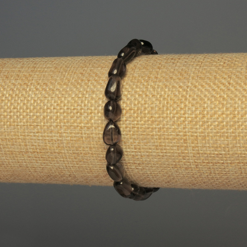 Brățară din topaz fumuriu facetat, diametrul 7-10×7 mm, lungime 18 cm +/-, pe elastic