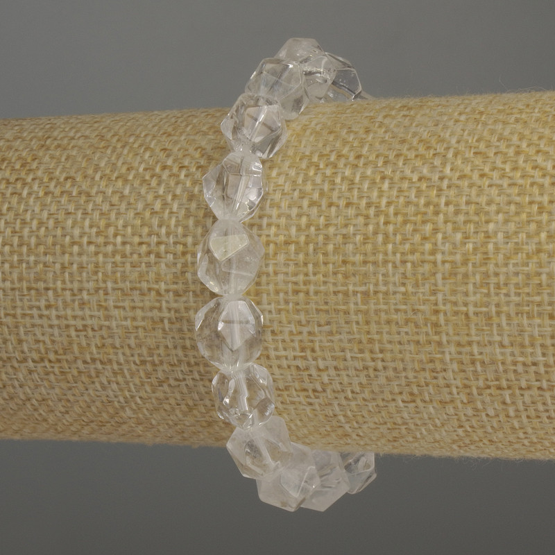 Brățară din cristal de munte, cu fețe multiple, diametrul aproximativ 10×9 mm, lungime 18 cm, pe bandă elastică