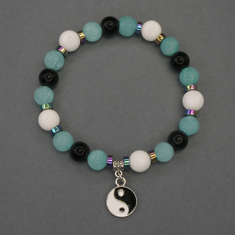 Brățară «Asortiment» cu bile netede, diametrul 8 mm ±, rondele 5x2 mm ±, lungimea 18 mm ±, pe bază elastică