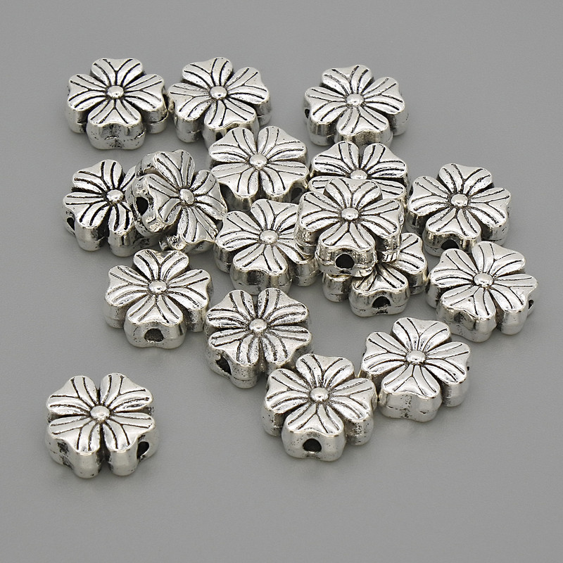 Inserție mărgea „Floare” culoare argintiu, diametru 9x9x3,5 mm, gaură 1,5 mm, ambalaj 20 g (~17 buc.)
