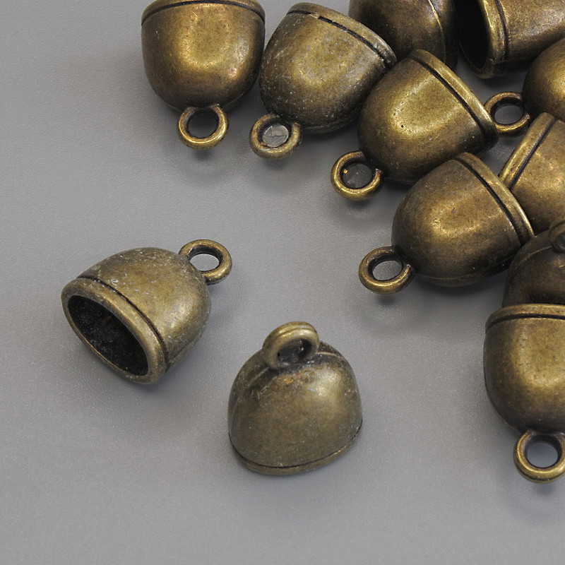 Pandantiv - clopoțel, culoare bronz metalic, diametrul 14×11 mm, ambalaj 12 buc.