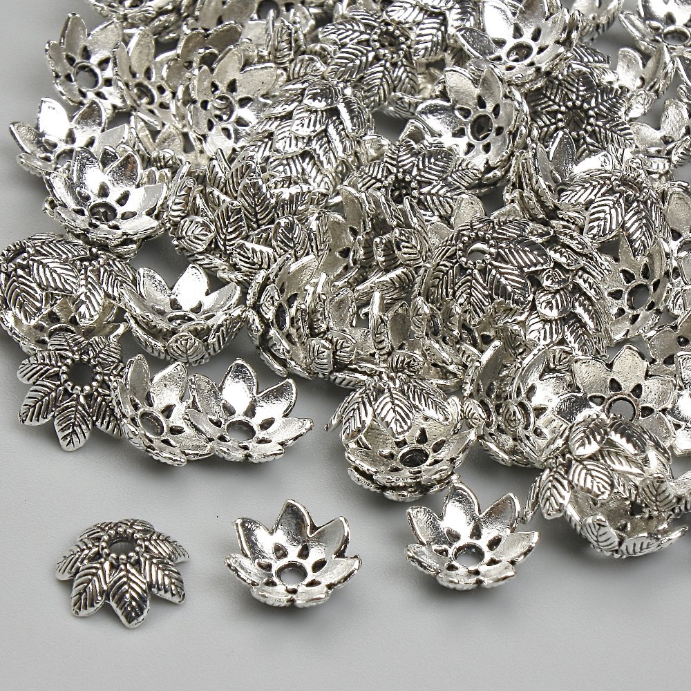 Capace pentru mărgele, culoare metalică argintiu, diametru 7 mm, diametrul găurii 1,7 mm ±, ambalare 20 g (~110 buc.)