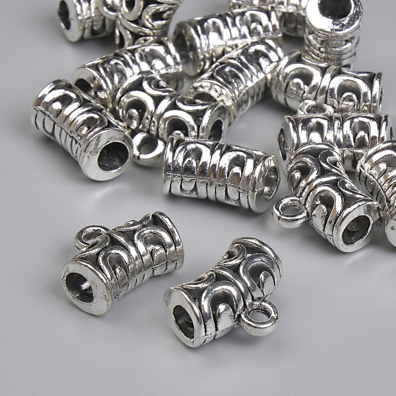 Furnitură bail, culoare metal argintiu, dimensiuni 12x6 mm +/- găuri, diametrul 3 mm +-, diametrul 2 mm +-, ambalare 20 g (~17 buc.)