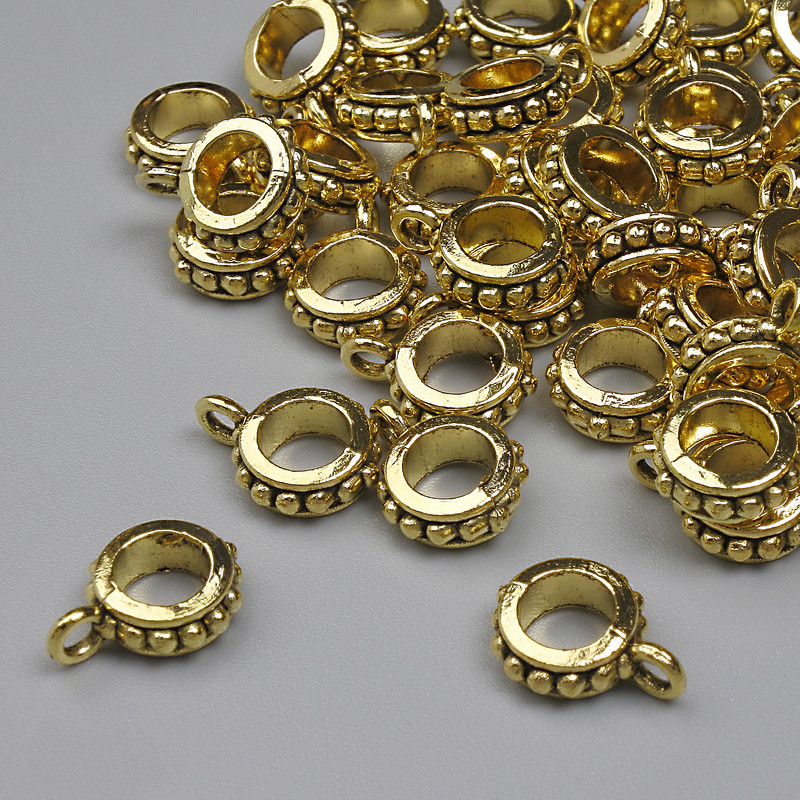 Furnitură bail, culoare aurie, dimensiuni 11×3 mm, găuri 4,5 mm și 2 mm, ambalaj 20 g, 46 buc