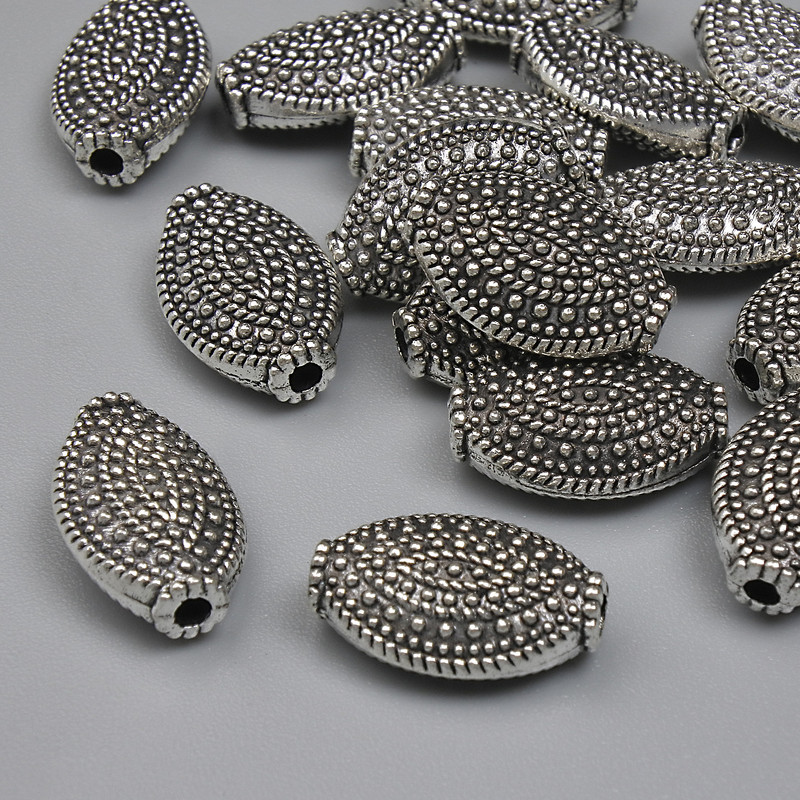 Furnitură – mărgea-inserație, culoare metalică argintie, diametru 12,5×7 mm, gaură de aproximativ 1,7 mm, ambalaj de aproximativ 20 g, circa 15 buc.