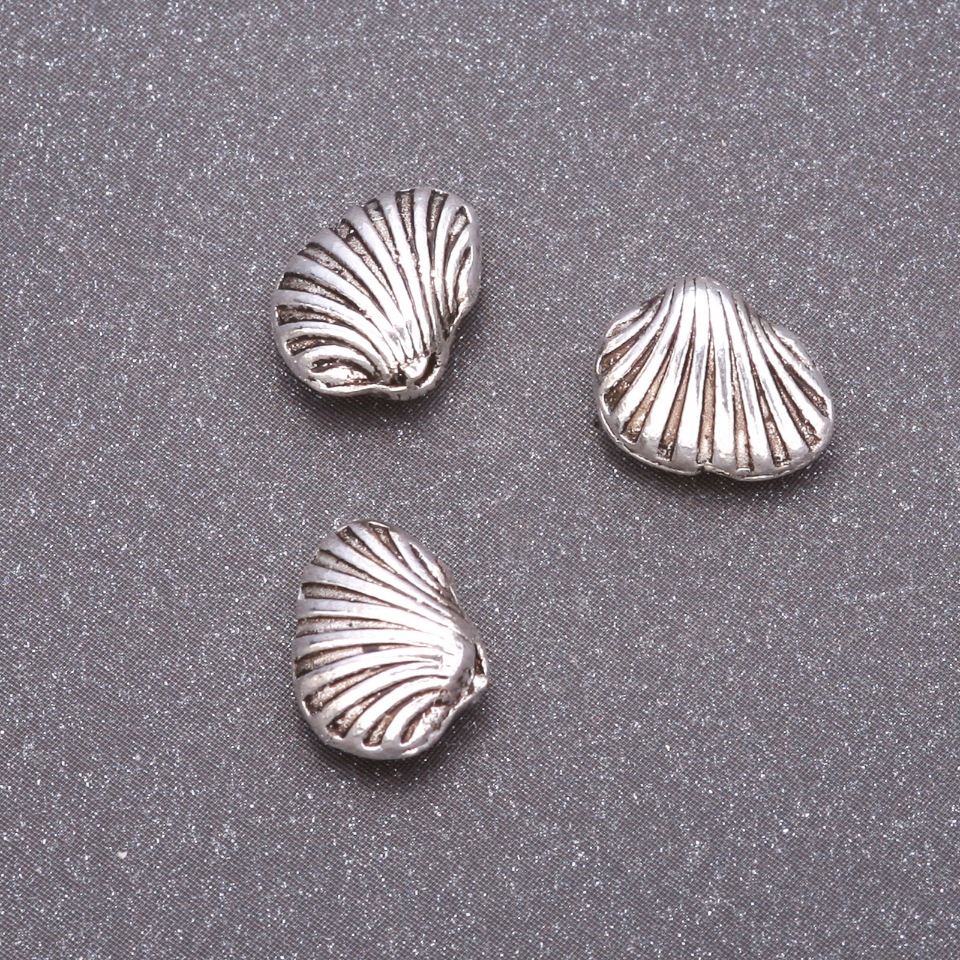 Furnitură – mărgea-inserație, diametru 10x9 mm, diametrul interior aproximativ 1,5 mm, ambalaj 20 g, ±16 buc.