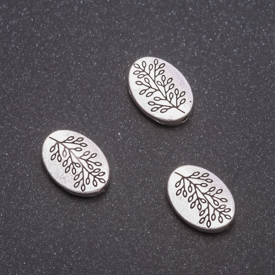 Mărgea-inserație «Ramură», diametru 14×10 mm, diametru interior 1,5 mm, ambalaj 20 g ± 13 buc.