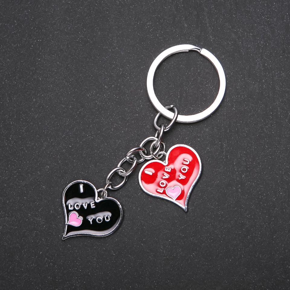 Breloc inimioare în culoare argintie