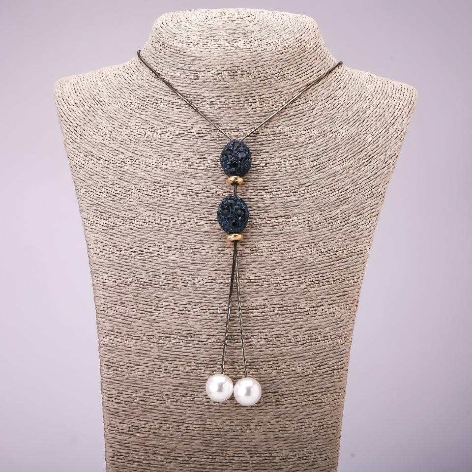 Pandantiv-cravată cu strasuri albastre pe lanț lung din metal «aur negru», diametrul 16×48 mm, lungime 70 cm