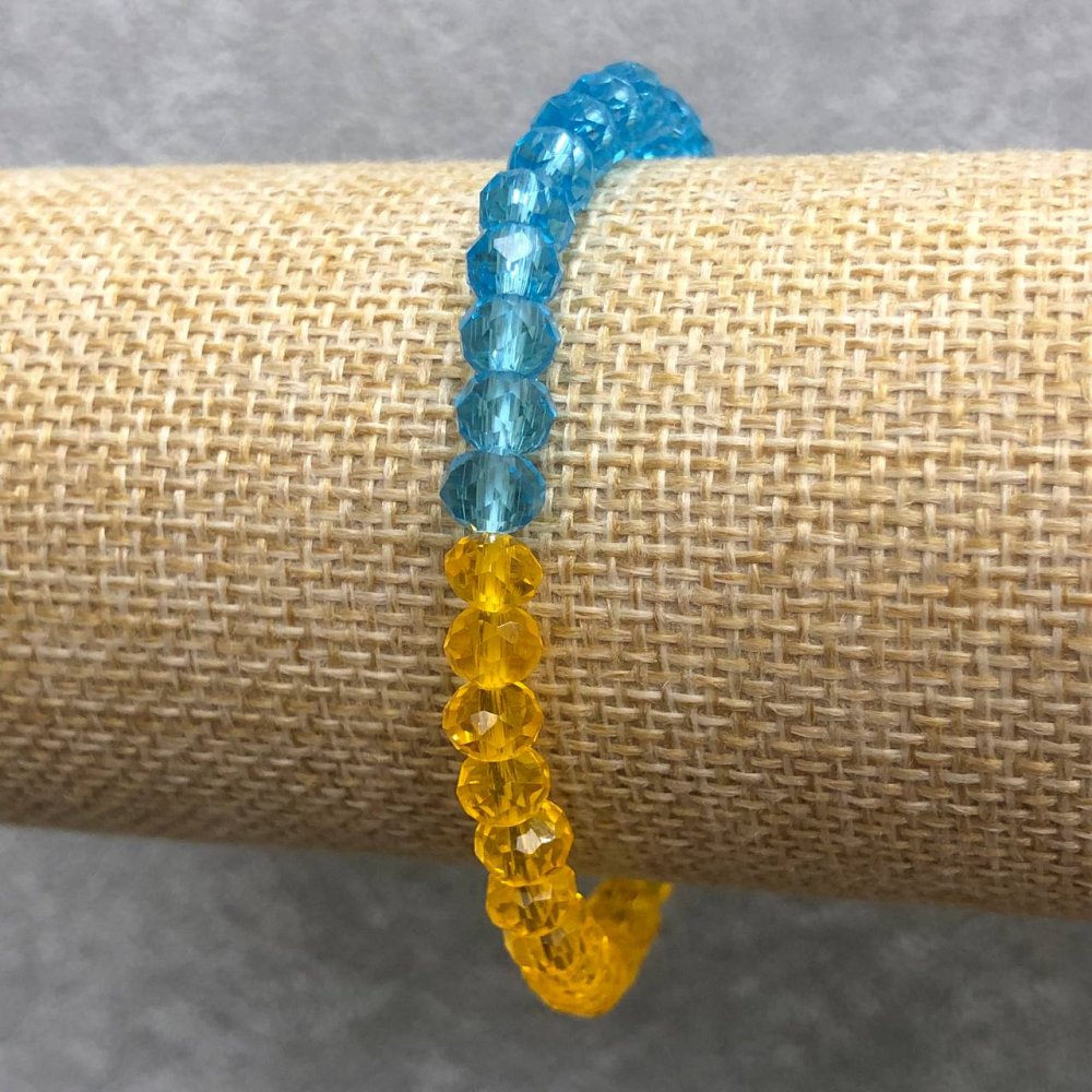 Браслет на гумці з Чеського Кришталю Україна гранований рондель, діаметр 6х4мм+-, довжина 18см+