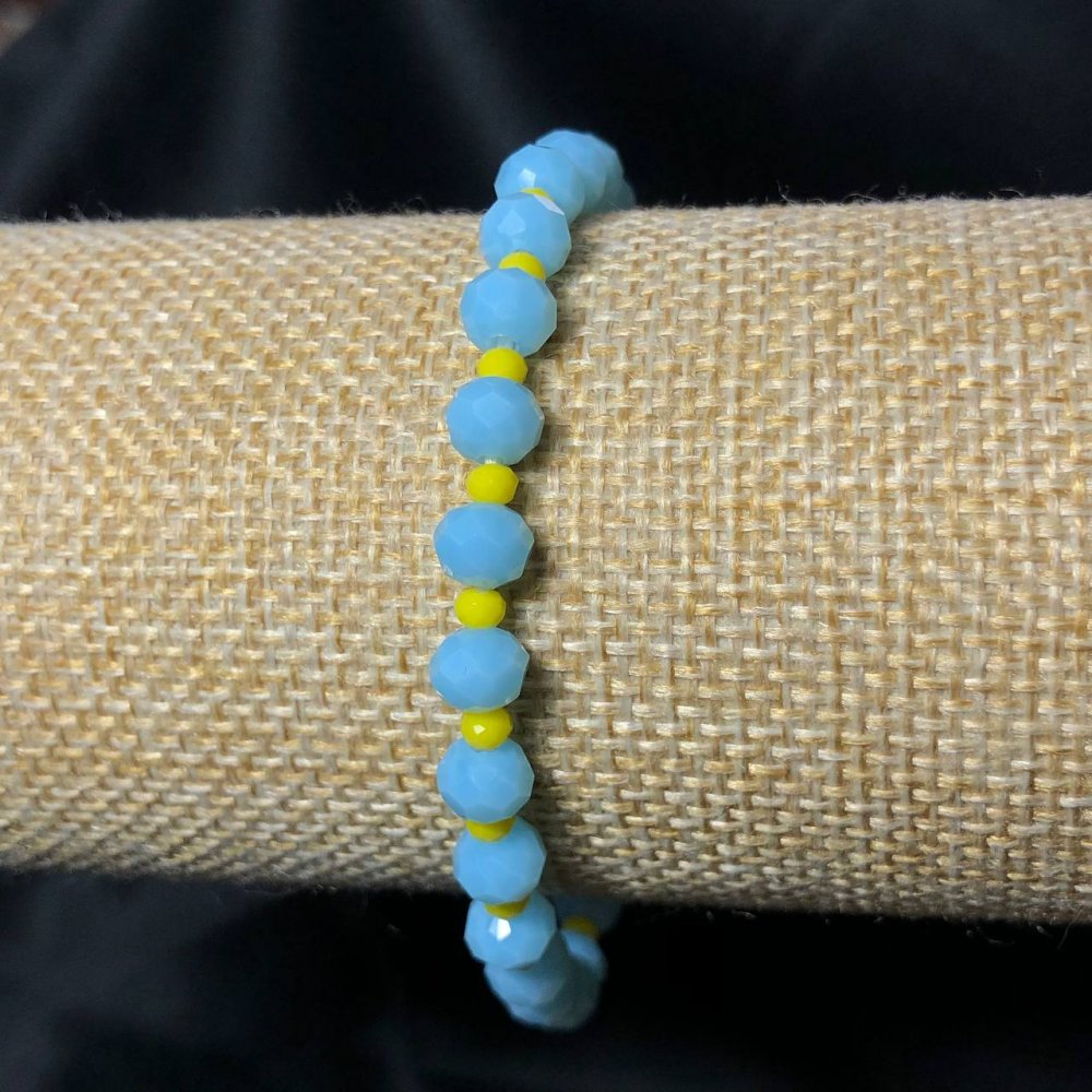 Браслет на гумці з Чеського Кришталю Україна гранований рондель, діаметр 6х4мм+-, довжина 18см+