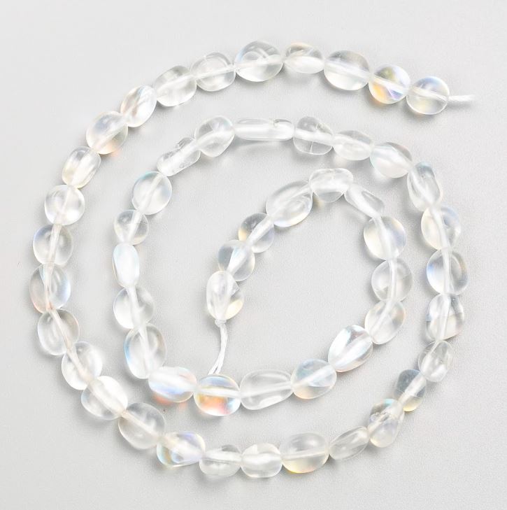 Mărgele pe șnur din sticlă opală, cu fațete, diametrul 6×7 mm, lungime 40 cm