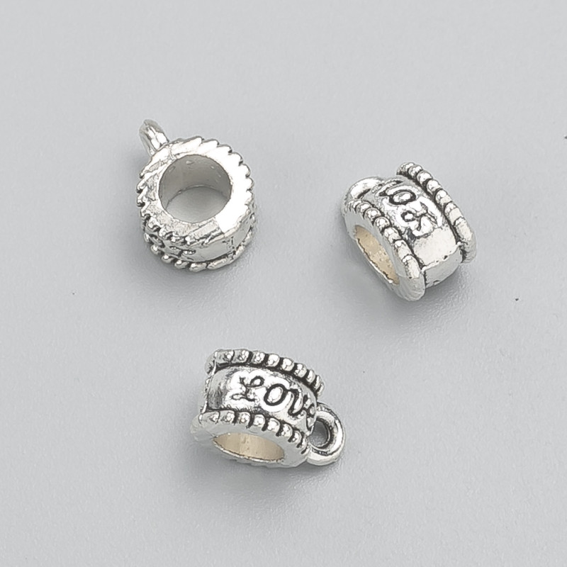 Furnitură bail – suport «Love», diametrul 8×6×11 mm, diametrul orificiului 4,5 mm, ambalaj 20 g, +/- 20 buc.