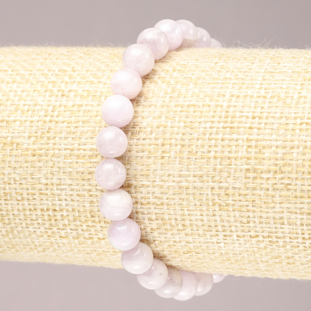 Brățară pe elastic din kunzit, bilute netede, diametrul de 7,5 mm