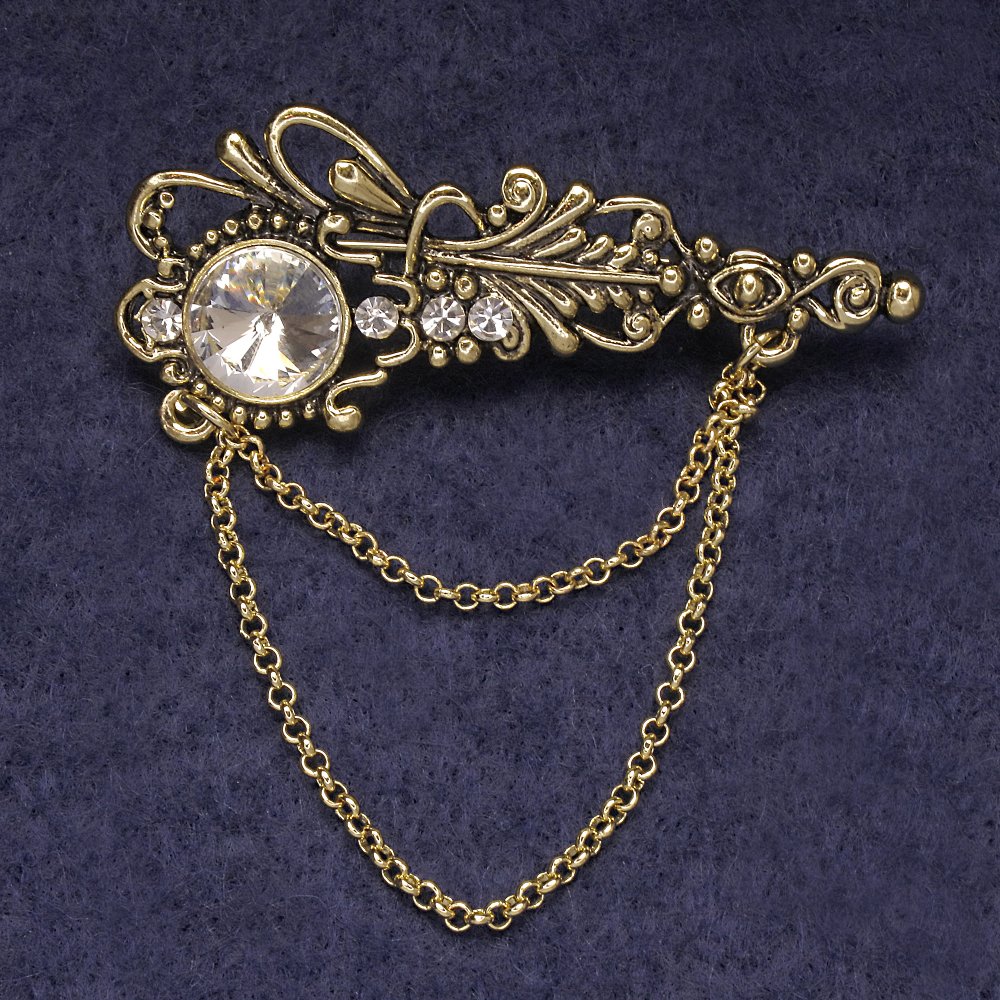 Broșă Accent cu strasuri albe și cristal central, metal auriu 55×22 mm